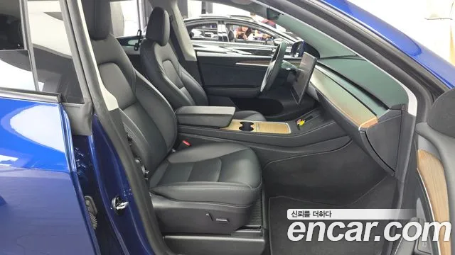 Tesla Model Y — Фото автомобиля 11