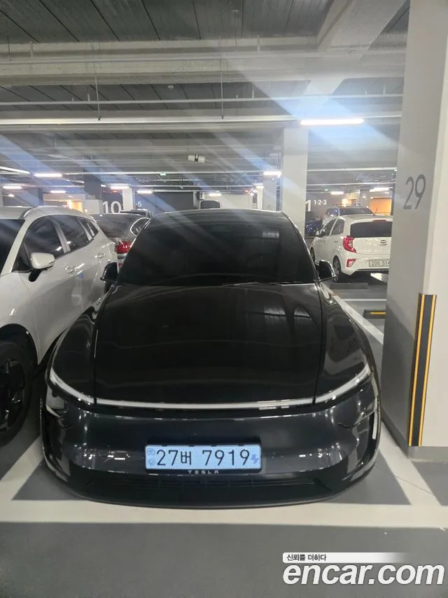 Tesla Model Y — Фото автомобиля 16