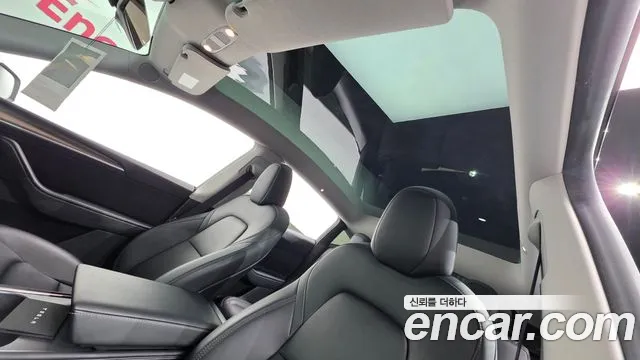 Tesla Model Y — Фото автомобиля 29