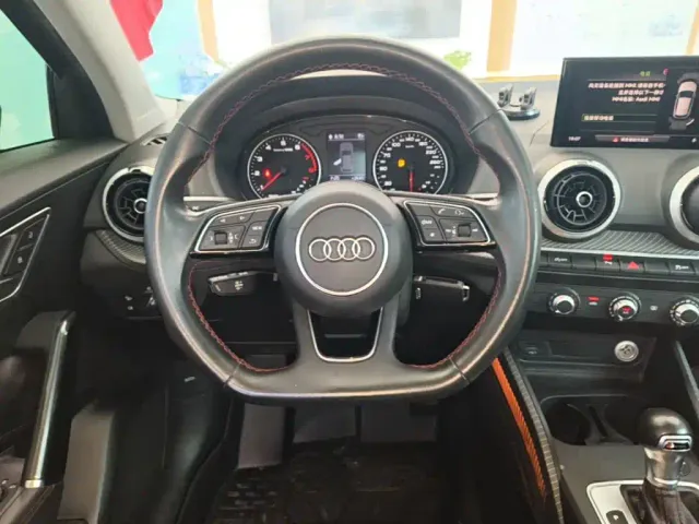 Audi Q2L — Фото автомобиля 10