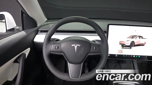 Tesla Model Y — Фото автомобиля 13