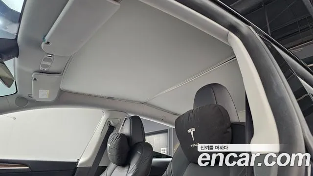 Tesla Model Y — Фото автомобиля 23