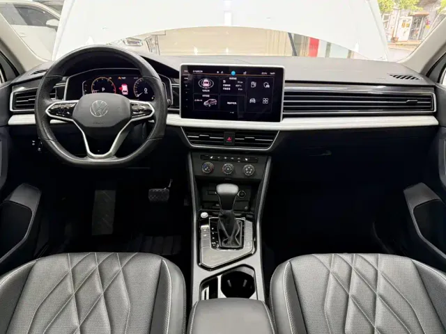 Volkswagen Tiguan L — Фото автомобиля 22