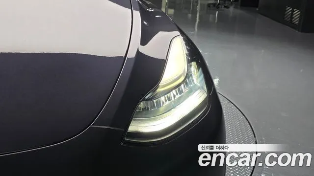 Tesla Model Y — Фото автомобиля 22