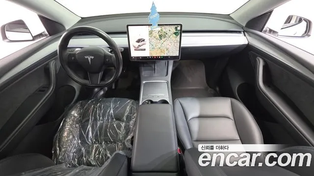 Tesla Model Y — Фото автомобиля 9