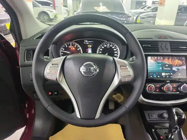Nissan Tiida — Фото автомобиля 10