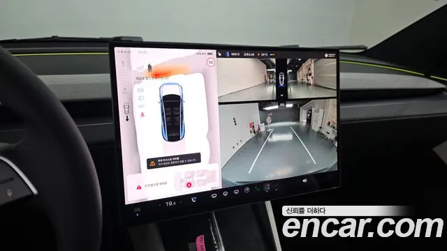 Tesla Model Y — Фото автомобиля 13