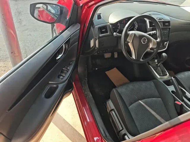 Nissan Tiida — Фото автомобиля 15