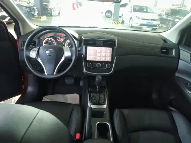 Nissan Tiida — Фото автомобиля 9