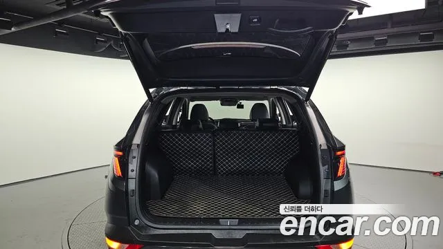 Hyundai Tucson Tucson (NX4) Бензин 1.6 Turbo 4WD — Фото автомобиля 27