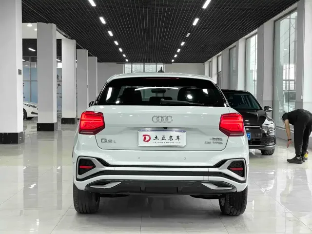 Audi Q2L — Фото автомобиля 5