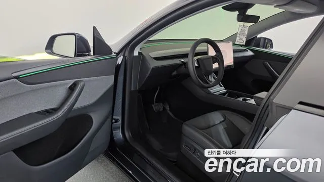 Tesla Model Y — Фото автомобиля 15