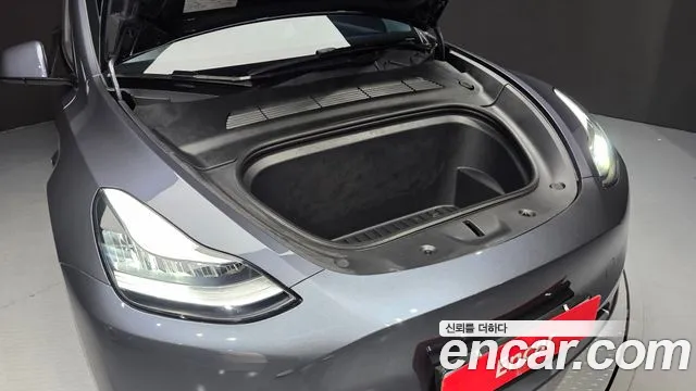 Tesla Model Y — Фото автомобиля 9