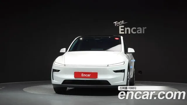 Tesla Model Y — Фото автомобиля 3