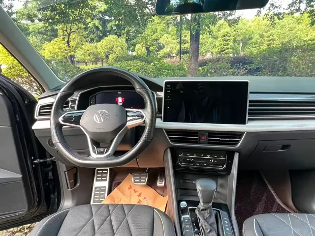 Volkswagen Tiguan L — Фото автомобиля 12