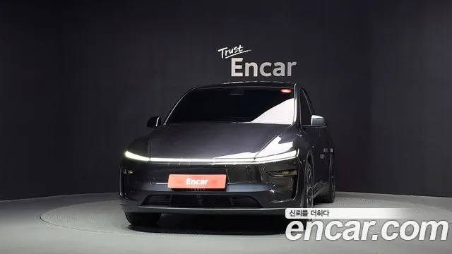 Tesla Model Y — Фото автомобиля 3