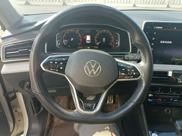 Volkswagen Tiguan L — Фото автомобиля 10