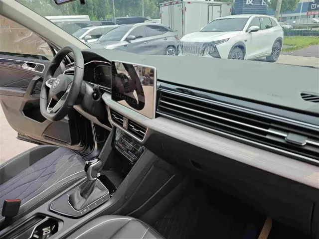 Volkswagen Tiguan L — Фото автомобиля 12