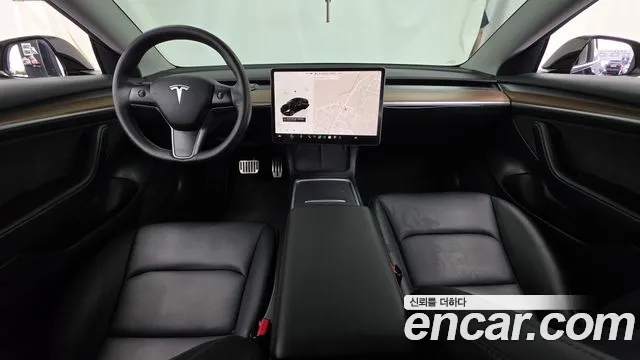 Tesla Model 3 — Фото автомобиля 10