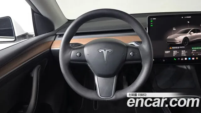 Tesla Model Y — Фото автомобиля 19
