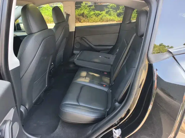 Tesla Model Y — Фото автомобиля 16