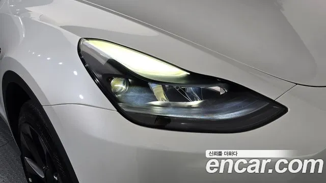 Tesla Model Y — Фото автомобиля 7