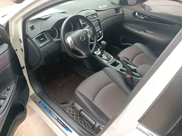 Nissan Tiida — Фото автомобиля 15
