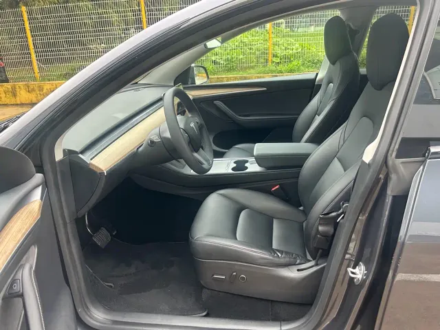Tesla Model Y — Фото автомобиля 7