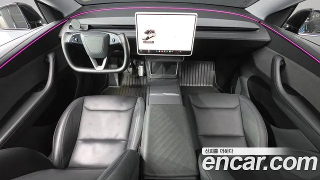 Tesla Model Y — Фото автомобиля 10