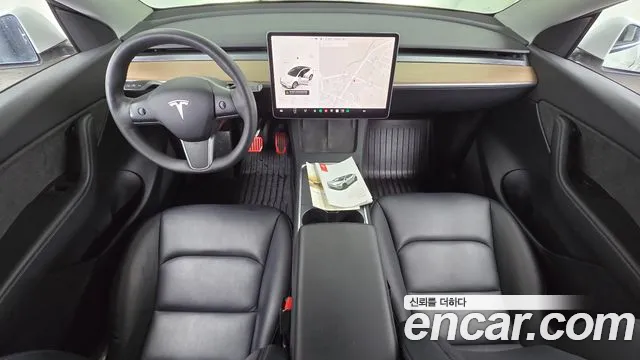 Tesla Model Y — Фото автомобиля 7