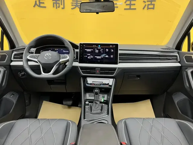 Volkswagen Tiguan L — Фото автомобиля 14