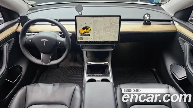 Tesla Model Y — Фото автомобиля 10