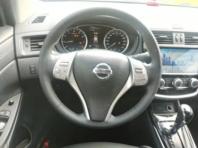 Nissan Tiida — Фото автомобиля 10
