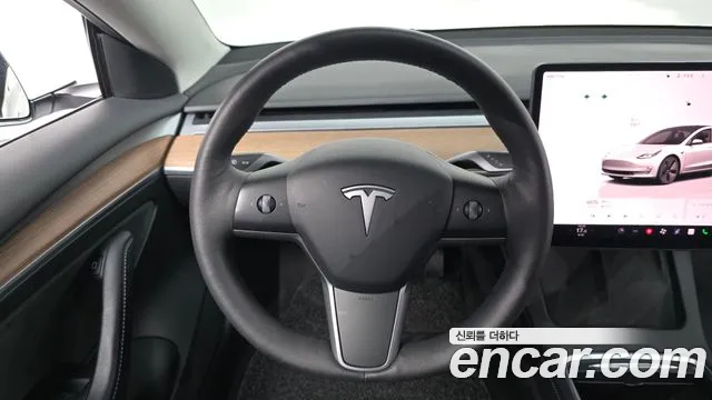 Tesla Model 3 — Фото автомобиля 11