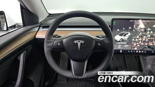 Tesla Model Y — Фото автомобиля 13