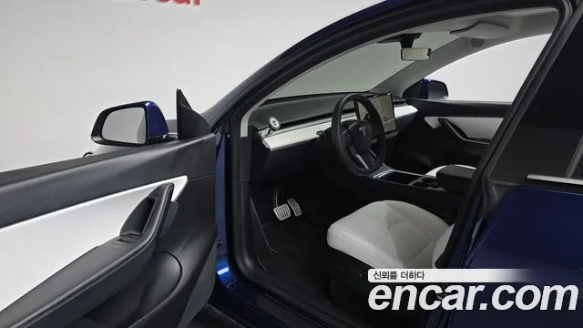 Tesla Model Y — Фото автомобиля 9
