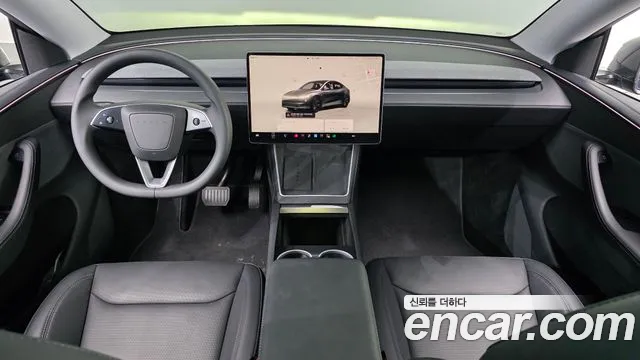 Tesla Model Y — Фото автомобиля 7