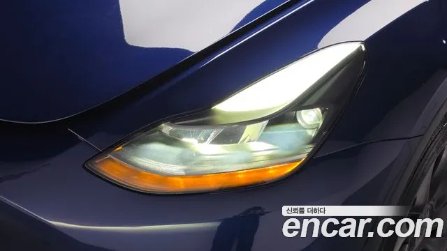 Tesla Model Y — Фото автомобиля 21