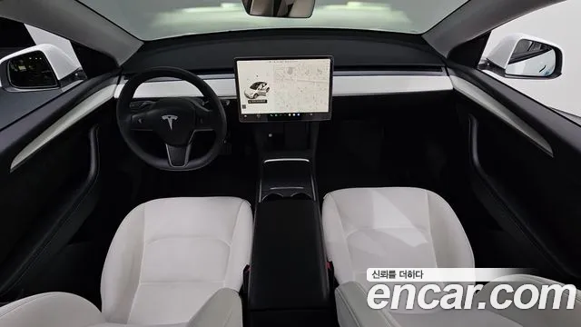 Tesla Model Y — Фото автомобиля 7