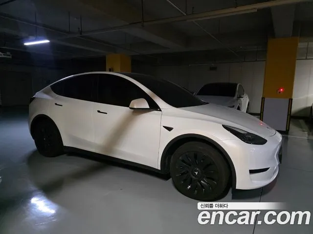 Tesla Model Y — Фото автомобиля 4