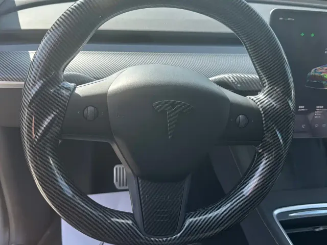 Tesla Model Y — Фото автомобиля 12