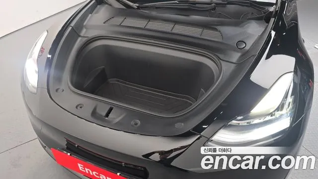 Tesla Model Y — Фото автомобиля 6