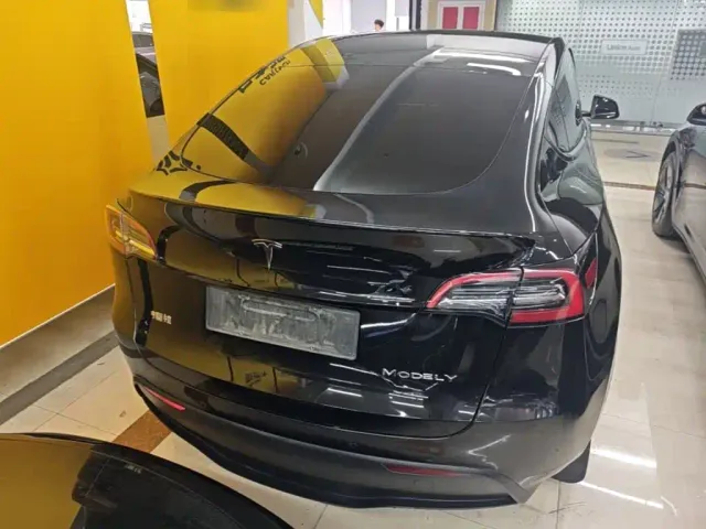 Tesla Model Y — Фото автомобиля 5