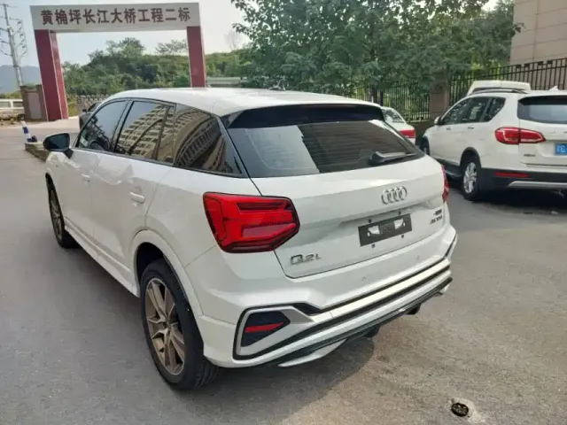 Audi Q2L — Фото автомобиля 9