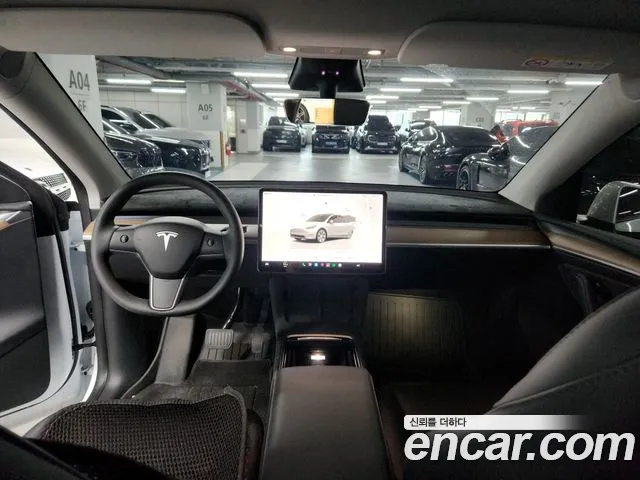 Tesla Model Y — Фото автомобиля 8