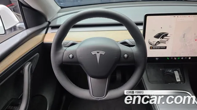 Tesla Model Y — Фото автомобиля 13