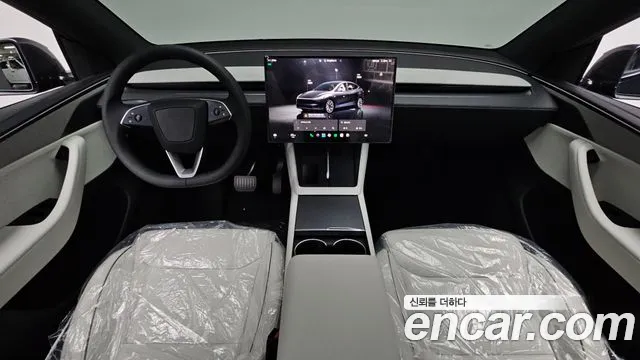 Tesla Model Y — Фото автомобиля 7