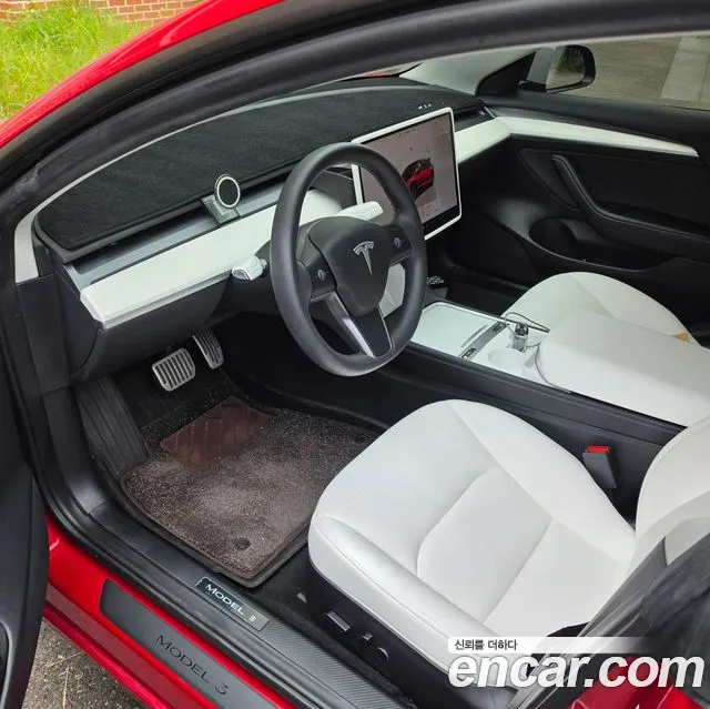 Tesla Model 3 — Фото автомобиля 6