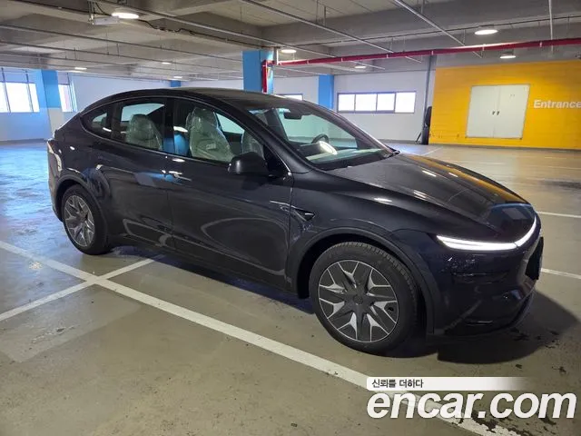 Tesla Model Y — Фото автомобиля 5