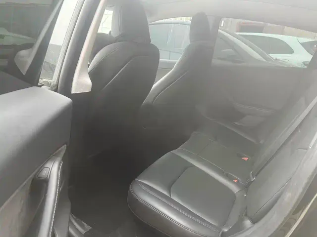 Tesla Model Y — Фото автомобиля 8